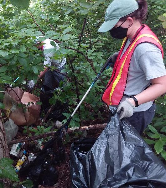 Cayleigh Picking up Trash